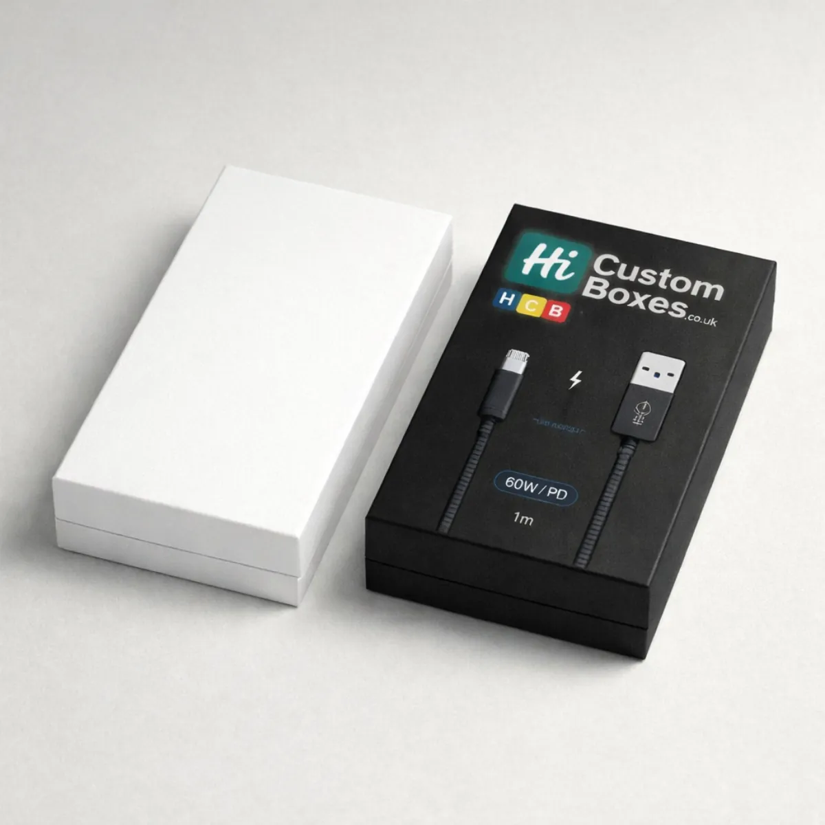 Two premium two-piece rigid boxes; one plain white and one black with detailed product printing. class=